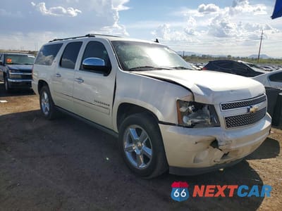 Czwarte zdjęcie samochodu z boku: 2011 CHEVROLET SUBURBAN C1500 LTZ VIN:1GNSCKE04BR125612 - miniatura
