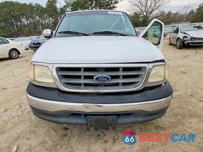 Piąte zdjęcie samochodu w środku: 2000 FORD F150 VIN:1FTZX1722YKB29289 - miniatura