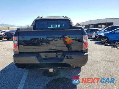 Zdjęcie 6 z 12 samochodu: 2006 HONDA RIDGELINE RTL VIN:2HJYK16526H532243 - miniatura