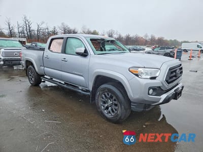 Czwarte zdjęcie samochodu z boku: 2020 TOYOTA TACOMA VIN:3TMDZ5BN0LM083928 - miniatura
