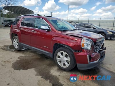 Czwarte zdjęcie samochodu z boku: 2017 GMC TERRAIN SLT VIN:2GKFLPE36H6136833 - miniatura