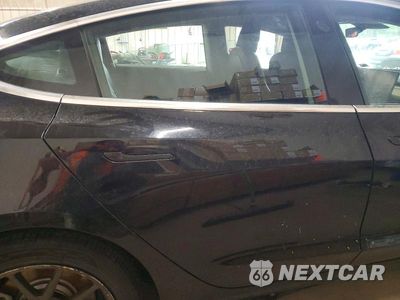 Zdjęcie 10 z 12 samochodu: 2019 TESLA MODEL 3 VIN:5YJ3E1EAXKF395959 - miniatura