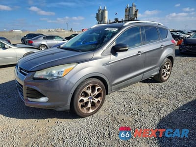 2014 FORD ESCAPE TITANIUM 1FMCU0J97EUE13530 - główne zdjęcie licytacji z USA - miniatura