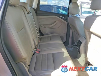 Zdjęcie 11 z 13 samochodu: 2014 FORD ESCAPE TITANIUM VIN:1FMCU9J90EUD26377 - miniatura