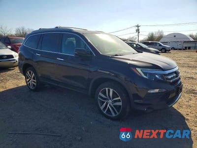 Czwarte zdjęcie samochodu z boku: 2017 HONDA PILOT TOURING VIN:5FNYF6H94HB086577 - miniatura