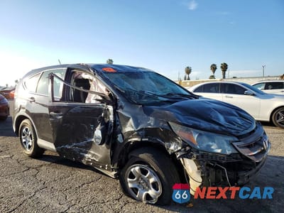 Czwarte zdjęcie samochodu z boku: 2012 HONDA CR-V LX VIN:2HKRM3H37CH505357 - miniatura