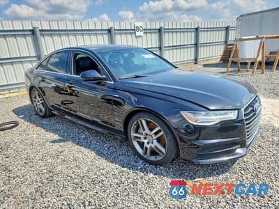 Czwarte zdjęcie samochodu z boku: 2017 AUDI A6 PREMIUM VIN:WAUC8AFC6HN064262 - miniatura