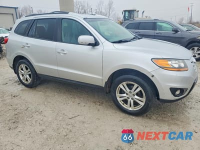 Czwarte zdjęcie samochodu z boku: 2011 HYUNDAI SANTA FE SE VIN:5XYZHDAG0BG051112 - miniatura
