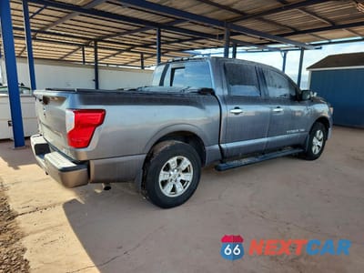 Trzecie zdjęcie samochodu z tyłu: 2018 NISSAN TITAN SV VIN:1N6AA1E69JN507713 - miniatura