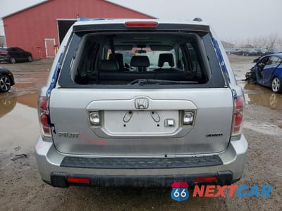 Zdjęcie 6 z 12 samochodu: 2006 HONDA PILOT EX VIN:2HKYF18776H548338 - miniatura