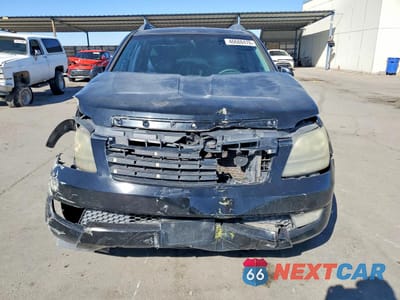 Piąte zdjęcie samochodu w środku: 2009 KIA BORREGO LX VIN:KNDJJ741295037287 - miniatura