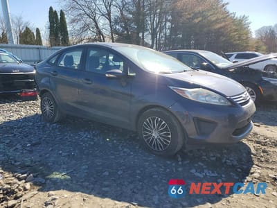 Czwarte zdjęcie samochodu z boku: 2013 FORD FIESTA SE VIN:3FADP4BJ7DM170889 - miniatura