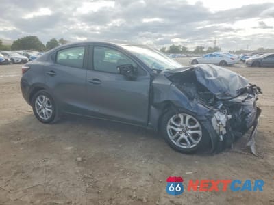 Czwarte zdjęcie samochodu z boku: 2017 TOYOTA YARIS IA BASE VIN:3MYDLBYV1HY174747 - miniatura