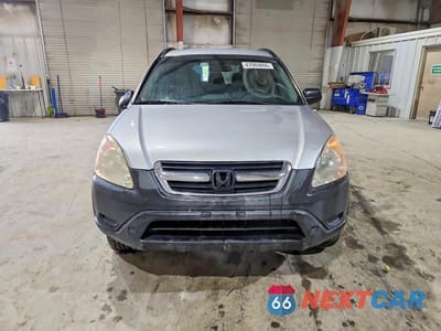 Piąte zdjęcie samochodu w środku: 2003 HONDA CR-V LX VIN:SHSRD68453U102771 - miniatura