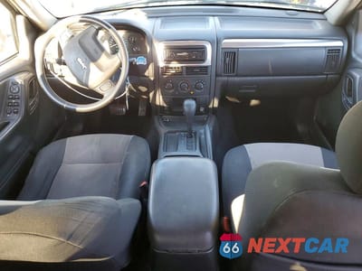 Zdjęcie 8 z 13 samochodu: 2004 JEEP GRAND CHEROKEE LAREDO VIN:1J4GX48S84C301234 - miniatura