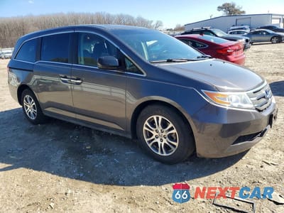 Czwarte zdjęcie samochodu z boku: 2012 HONDA ODYSSEY EXL VIN:5FNRL5H60CB087084 - miniatura