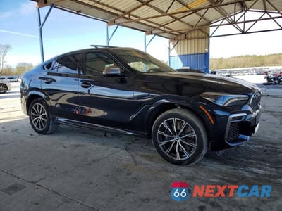 Czwarte zdjęcie samochodu z boku: 2022 BMW X6 M50I VIN:5UXCY8C09N9K61712 - miniatura