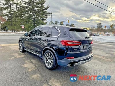 Czwarte zdjęcie samochodu z boku: 2019 BMW X5 XDRIVE50I VIN:5UXJU2C51KLN65059 - miniatura