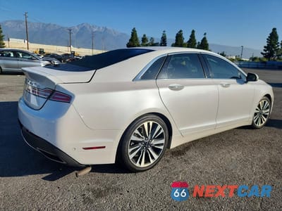 Trzecie zdjęcie samochodu z tyłu: 2019 LINCOLN MKZ RESERVE II VIN:3LN6L5MU7KR627269 - miniatura