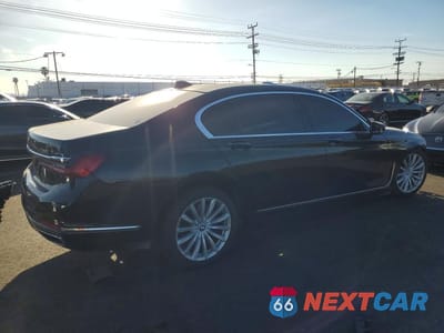 Trzecie zdjęcie samochodu z tyłu: 2022 BMW 740 I VIN:WBA7T2C04NCJ55439 - miniatura