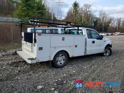 Trzecie zdjęcie samochodu z tyłu: 2007 FORD F 150 UTILITY / SERVICE TRUCK VIN:1FTVF12597KD29197 - miniatura