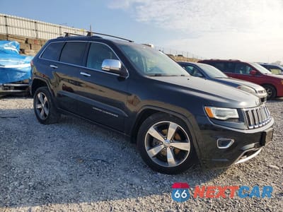 Czwarte zdjęcie samochodu z boku: 2016 JEEP GRAND CHEROKEE OVERLAND VIN:1C4RJFCG2GC492166 - miniatura