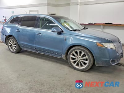 Czwarte zdjęcie samochodu z boku: 2010 LINCOLN MKT VIN:2LMHJ5ATXABJ03366 - miniatura