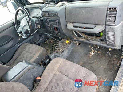 Zdjęcie 8 z 12 samochodu: 2003 JEEP WRANGLER COMMANDO VIN:1J4FA39S33P352590 - miniatura