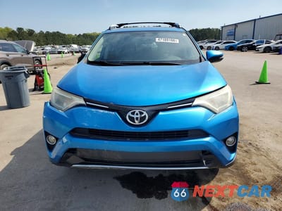 Piąte zdjęcie samochodu w środku: 2016 TOYOTA RAV4 XLE VIN:JTMWFREV8GD084833 - miniatura