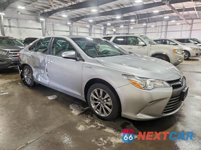 Czwarte zdjęcie samochodu z boku: 2017 TOYOTA CAMRY HYBRID XLE VIN:4T1BD1FK5HU221881 - miniatura