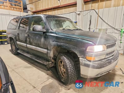 Czwarte zdjęcie samochodu z boku: 2002 CHEVROLET SUBURBAN K1500 VIN:1GNFK16Z72J188147 - miniatura