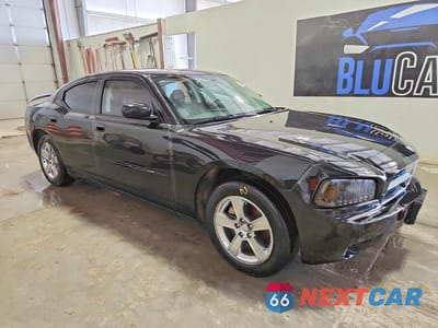 Czwarte zdjęcie samochodu z boku: 2008 DODGE CHARGER SXT VIN:2B3KA33G28H157313 - miniatura
