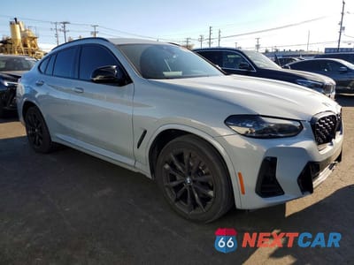 Czwarte zdjęcie samochodu z boku: 2023 BMW X4 XDRIVE30I VIN:5UX33DT06P9S04894 - miniatura