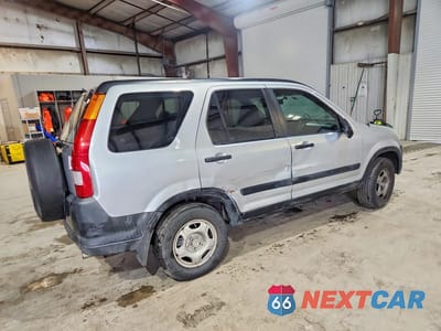 Trzecie zdjęcie samochodu z tyłu: 2003 HONDA CR-V LX VIN:SHSRD68453U102771 - miniatura
