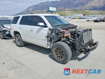 Czwarte zdjęcie samochodu z boku: 2017 CHEVROLET TAHOE K1500 PREMIER VIN:1GNSKCKC0HR368656 - miniatura
