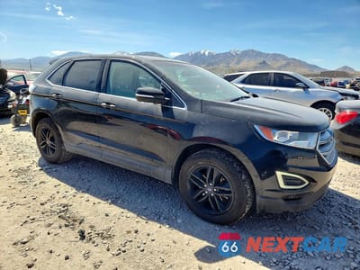 Czwarte zdjęcie samochodu z boku: 2017 FORD EDGE SEL VIN:2FMPK3J92HBB31217 - miniatura