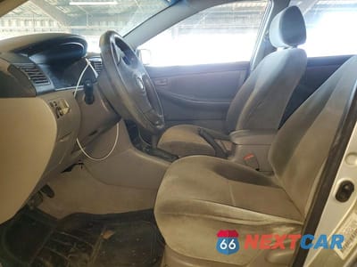Zdjęcie 7 z 12 samochodu: 2003 TOYOTA COROLLA CE VIN:1NXBR32E63Z047888 - miniatura