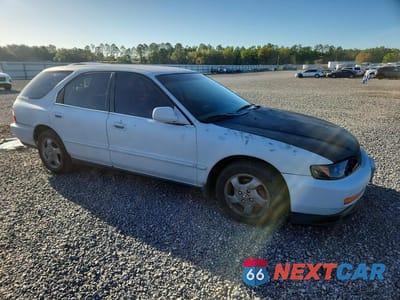 Czwarte zdjęcie samochodu z boku: 1997 HONDA ACCORD LX VIN:1HGCE1828VA009719 - miniatura