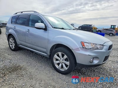 Czwarte zdjęcie samochodu z boku: 2010 MITSUBISHI OUTLANDER XLS VIN:JA4JT4AX4AZ004784 - miniatura