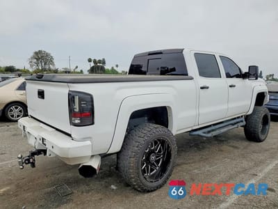 Trzecie zdjęcie samochodu z tyłu: 2015 GMC SIERRA K3500 DENALI VIN:1GT424E82FF646695 - miniatura