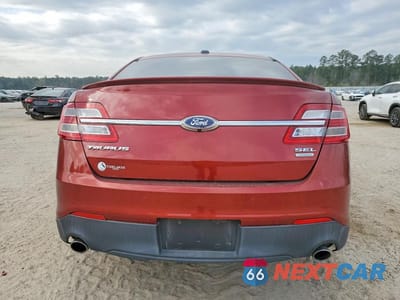 Zdjęcie 6 z 11 samochodu: 2014 FORD TAURUS SEL VIN:1FAHP2E91EG147756 - miniatura