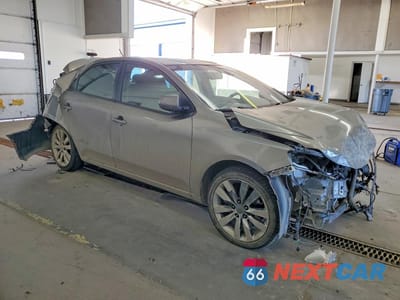 Czwarte zdjęcie samochodu z boku: 2011 KIA FORTE SX VIN:KNAFW4A34B5395795 - miniatura