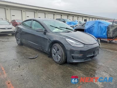 Czwarte zdjęcie samochodu z boku: 2022 TESLA 3 VIN:5YJ3E1EB4NF251210 - miniatura