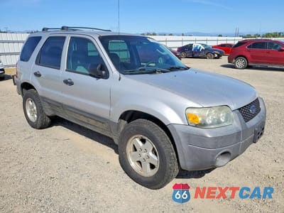 Czwarte zdjęcie samochodu z boku: 2005 FORD ESCAPE XLT VIN:1FMYU93175KA70926 - miniatura