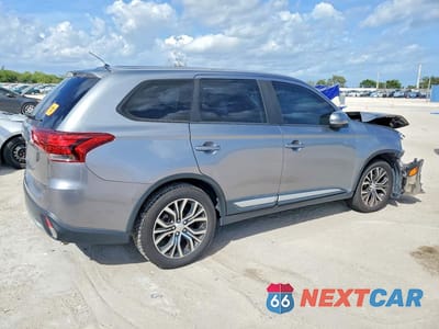 Trzecie zdjęcie samochodu z tyłu: 2016 MITSUBISHI OUTLANDER SE VIN:JA4AD3A36GZ049979 - miniatura