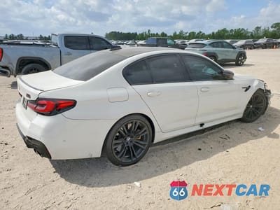 Trzecie zdjęcie samochodu z tyłu: 2021 BMW M5 VIN:WBS83CH00MCE98345 - miniatura