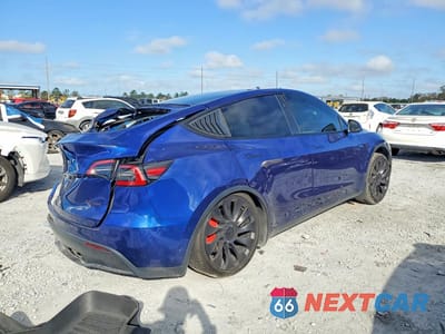 Trzecie zdjęcie samochodu z tyłu: 2023 TESLA MODEL Y VIN:7SAYGDEF3PF852795 - miniatura
