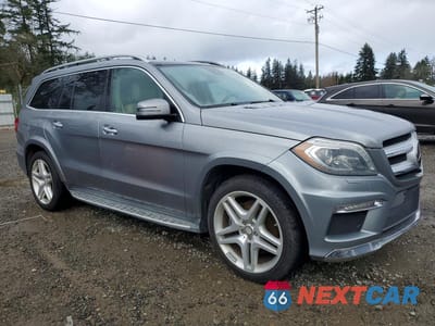 Czwarte zdjęcie samochodu z boku: 2014 MERCEDES-BENZ GL 550 4MATIC VIN:4JGDF7DE2EA325745 - miniatura