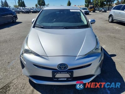 Piąte zdjęcie samochodu w środku: 2017 TOYOTA PRIUS TWO VIN:JTDKBRFU2H3576426 - miniatura