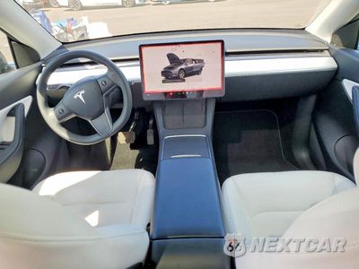 Zdjęcie 8 z 12 samochodu: 2022 TESLA MODEL Y VIN:7SAYGDEE3NF409650 - miniatura